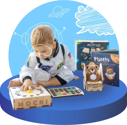 boy on podium with mochi kit